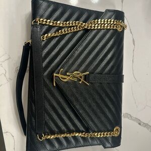 Yves Saint Laurent black caviar leather envelope bag with gold chain